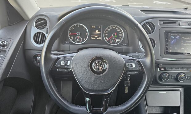 Миниатюра 30 Volkswagen Tiguan 2014